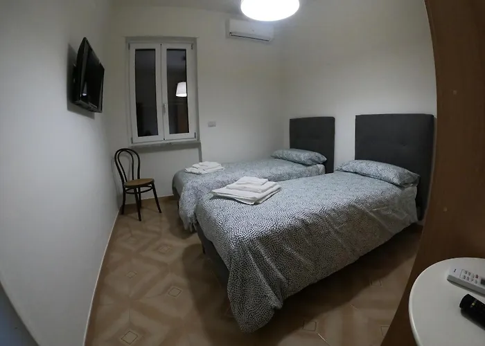 Quarto em Acomodações Particulares Casa Rossi *