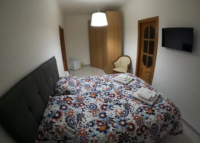 Quarto em Acomodações Particulares Casa Rossi *